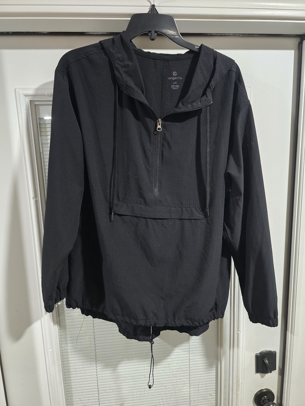 Tangerine Black Performance Top with Subtle Logo Flower